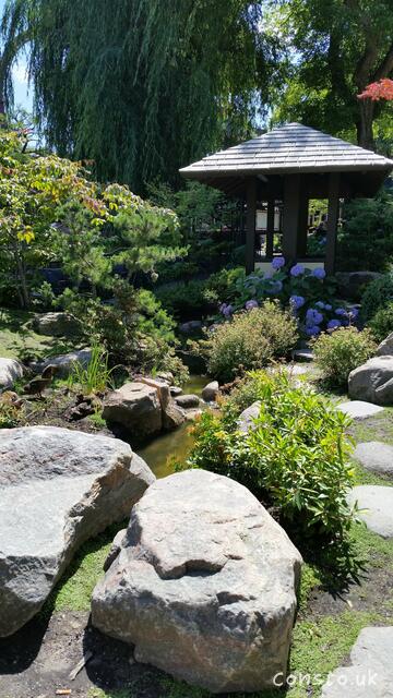 A Japanese Syled Garden In The Middle Of The Park