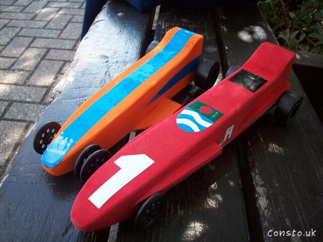 Two Brightly Coloured, Gas Canister Powered Vehicles